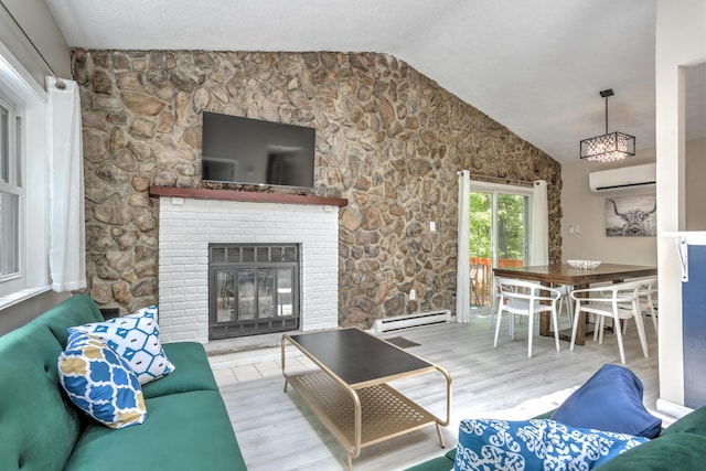 living room featuring a baseboard radiator, lofted ceiling, an AC wall unit, a brick fireplace, and wood finished floors