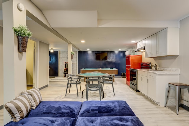 playroom with recessed lighting, pool table, a sink, baseboards, and light wood finished floors