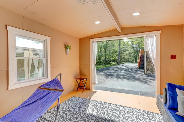 entryway featuring lofted ceiling with beams and recessed lighting