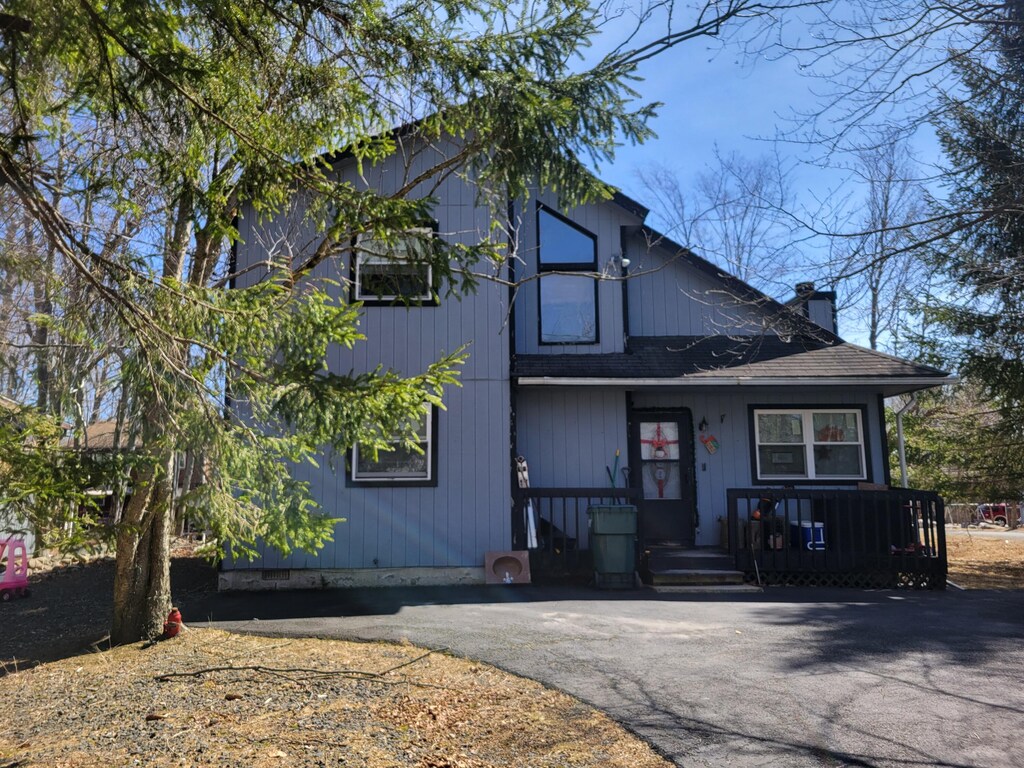 6319 Ventnor Dr, Tobyhanna, PA 18466 - view of front of house featuring roof with shingles and a chimney