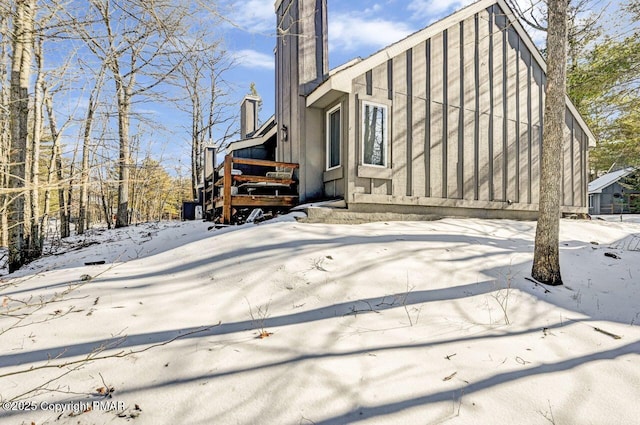 view of snow covered property