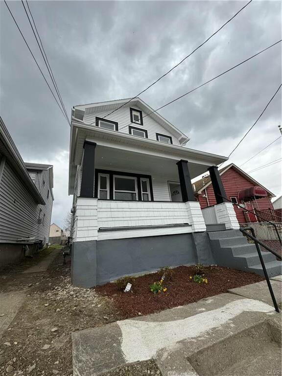 view of front of house with covered porch