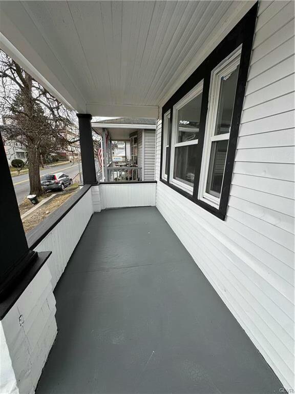 view of patio featuring a porch