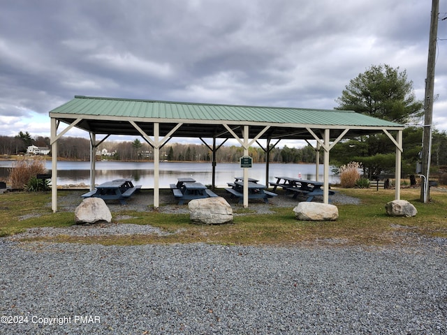 view of parking with a water view