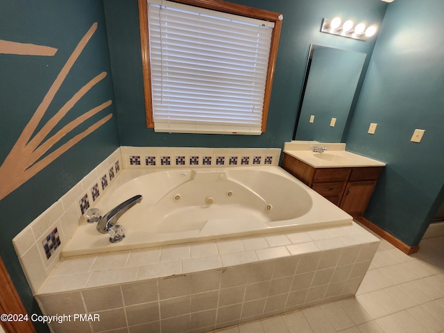 full bath featuring tile patterned flooring, vanity, and a whirlpool tub