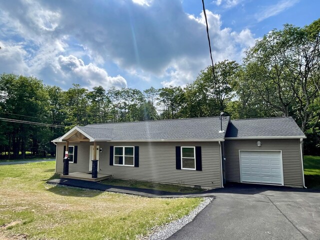 39 Berryman Ln, Albrightsville, PA 18210 - view of exterior entry with a shingled roof