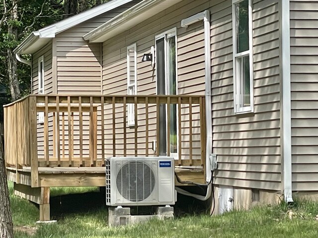 39 Berryman Ln, Albrightsville, PA 18210 - ranch-style home with driveway, a garage, a front lawn, and view of scattered trees