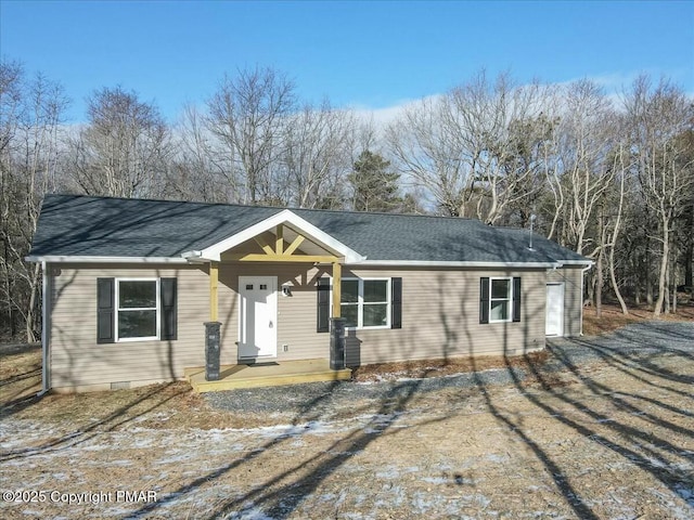 ranch-style house featuring a garage, driveway, crawl space, and roof with shingles