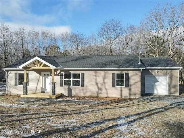 ranch-style home featuring a garage, roof with shingles, crawl space, and driveway