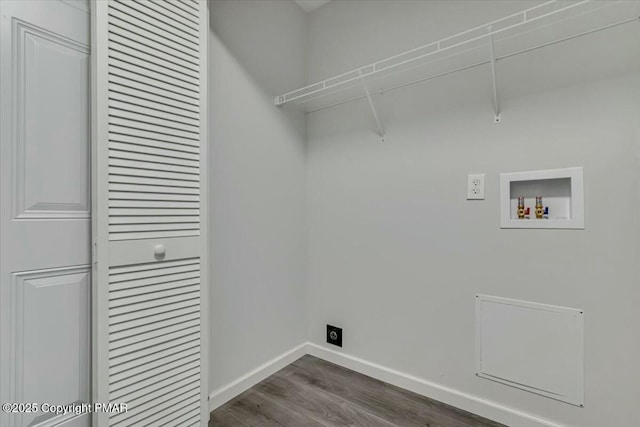 laundry area featuring laundry area, baseboards, dark wood-style floors, washer hookup, and electric dryer hookup