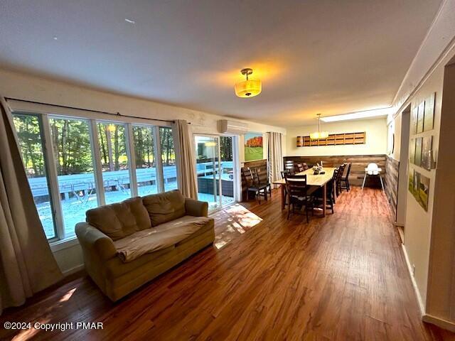 living room featuring dark wood-style floors