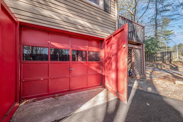 garage with fence