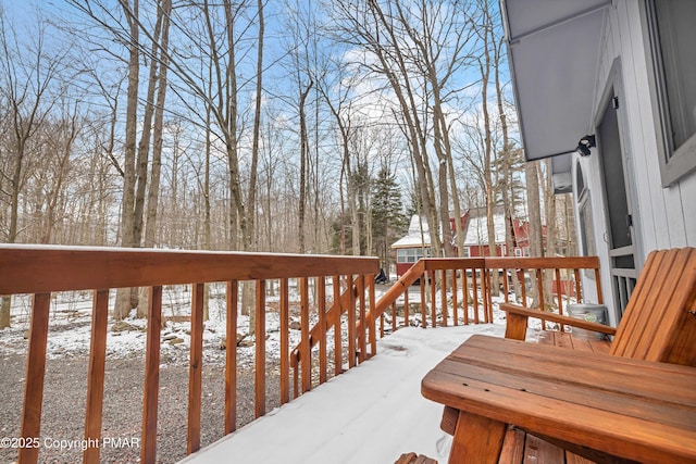 view of snow covered deck