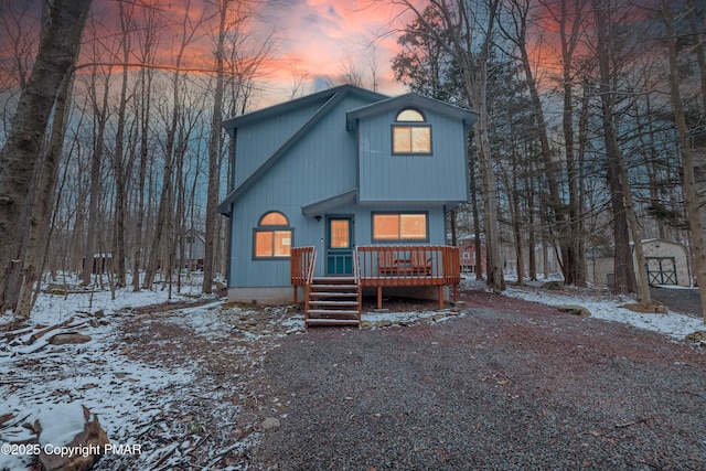 chalet / cabin with a deck