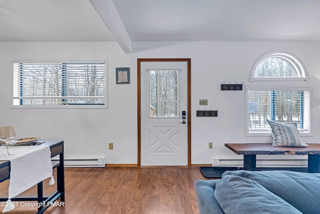 entryway featuring beam ceiling, a baseboard heating unit, dark wood-type flooring, and baseboards