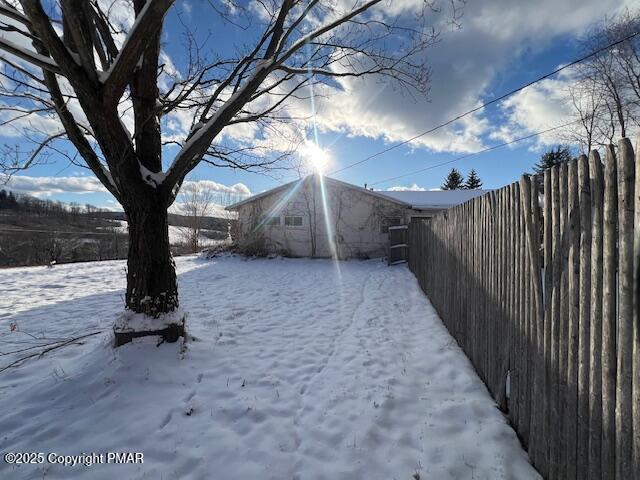 view of snowy yard