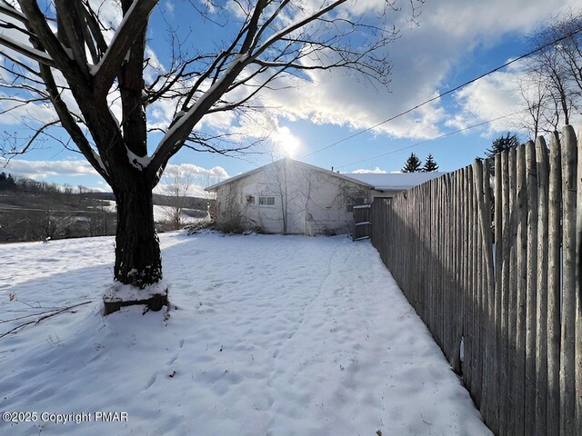 view of snowy yard