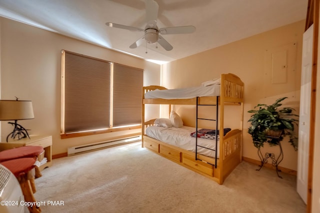 carpeted bedroom featuring a ceiling fan, baseboards, and a baseboard radiator