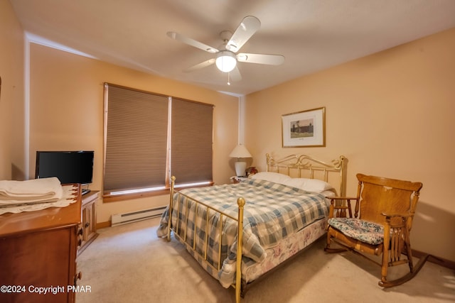 bedroom with ceiling fan, light carpet, and a baseboard radiator