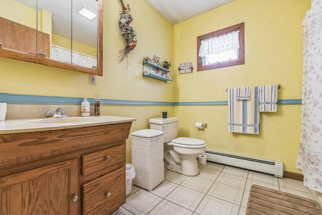 full bath with tile patterned flooring, vanity, toilet, baseboards, and a baseboard radiator