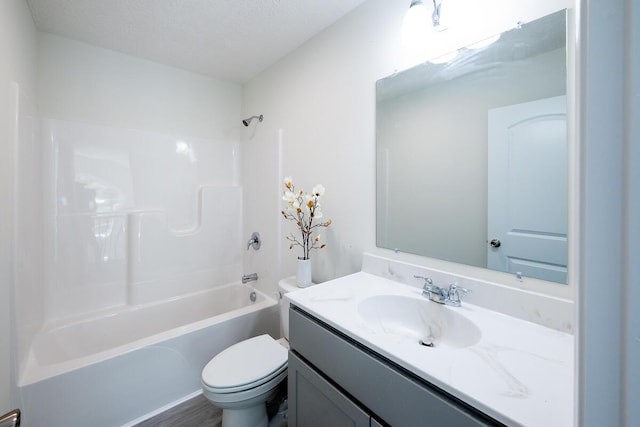 9133 Belvedere Rd # 5020, Tobyhanna, PA 18466 - bathroom with toilet, vanity,  shower combination, and wood finished floors