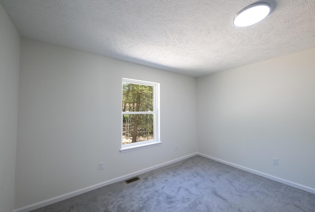 9133 Belvedere Rd # 5020, Tobyhanna, PA 18466 - empty room featuring carpet flooring, baseboards, and a textured ceiling