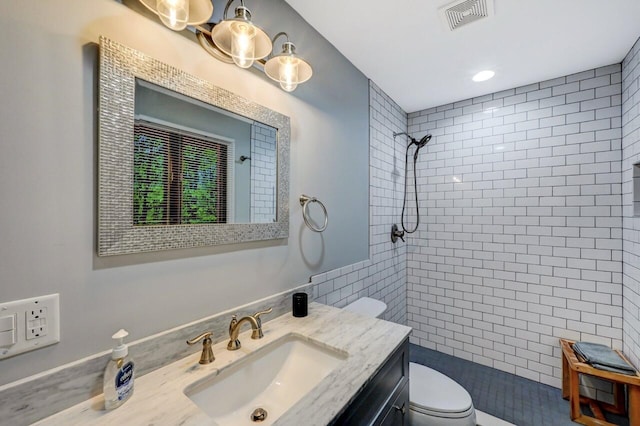 3207 Green Meadow Cir, Pocono Pines, PA 18350 - full bath featuring toilet, a tile shower, and vanity