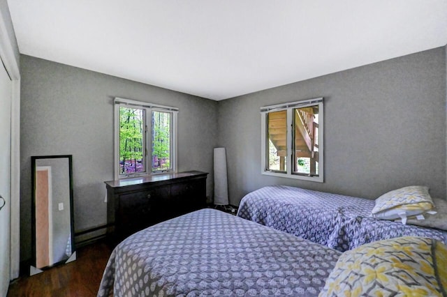 3207 Green Meadow Cir, Pocono Pines, PA 18350 - bedroom featuring dark wood-type flooring