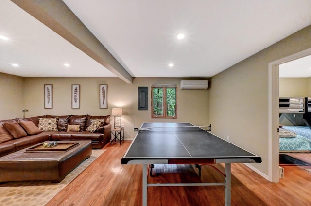 3207 Green Meadow Cir, Pocono Pines, PA 18350 - game room with a wall mounted air conditioner, wood finished floors, recessed lighting, and baseboards