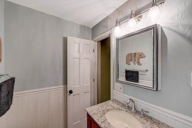 3207 Green Meadow Cir, Pocono Pines, PA 18350 - bathroom featuring vanity and a wainscoted wall
