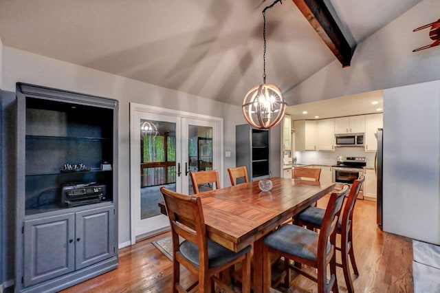 3207 Green Meadow Cir, Pocono Pines, PA 18350 - dining area featuring light wood-style flooring, a chandelier, and french doors