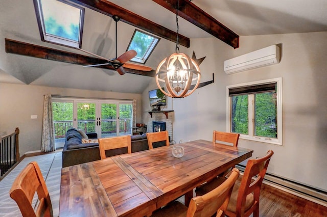 3207 Green Meadow Cir, Pocono Pines, PA 18350 - dining area featuring an AC wall unit, baseboard heating, baseboards, wood finished floors, and a skylight