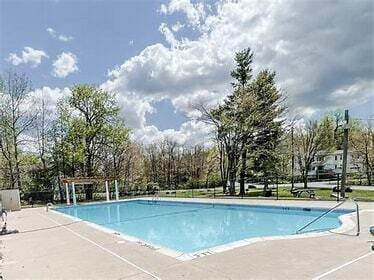 community pool featuring a patio area