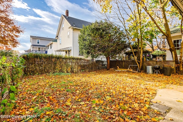 view of yard with fence