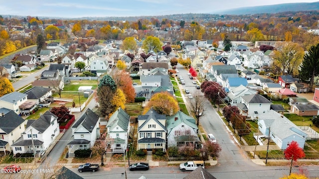 birds eye view of property with a residential view