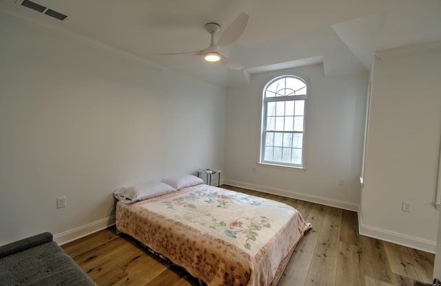 109 Forest Lake Dr, Jim Thorpe, PA 18229 - bedroom with hardwood / wood-style flooring, crown molding, a ceiling fan, and radiator