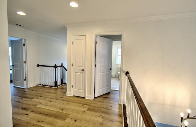 109 Forest Lake Dr, Jim Thorpe, PA 18229 - hall featuring an upstairs landing, crown molding, wood finished floors, and recessed lighting