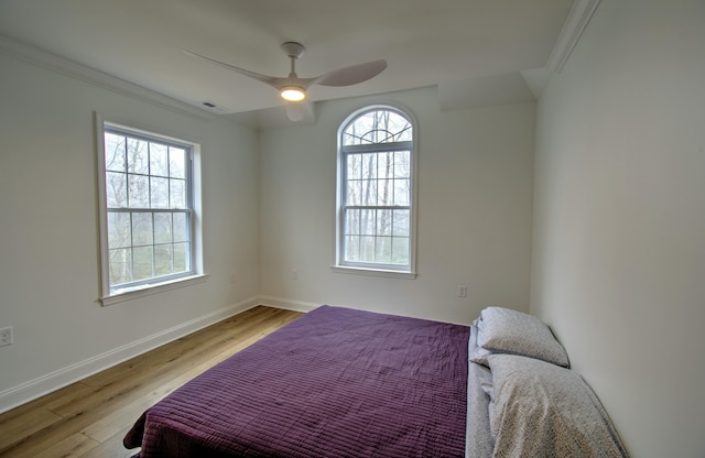 109 Forest Lake Dr, Jim Thorpe, PA 18229 - bedroom with multiple windows, wood finished floors, ornamental molding, and ceiling fan