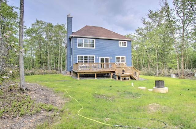 109 Forest Lake Dr, Jim Thorpe, PA 18229 - back of house with a chimney, a wooden deck, and a lawn