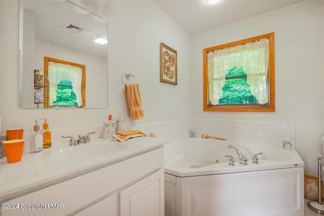 277 Packanack Dr, Clifton Township, PA 18424 - bathroom featuring vanity and a whirlpool tub