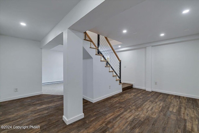 120 St Andrews Dr, Bushkill, PA 18324 - finished basement with wood finished floors, baseboards, stairway, baseboard heating, and recessed lighting