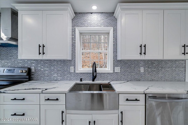 120 St Andrews Dr, Bushkill, PA 18324 - kitchen featuring stainless steel appliances, white cabinets, backsplash, and light stone countertops