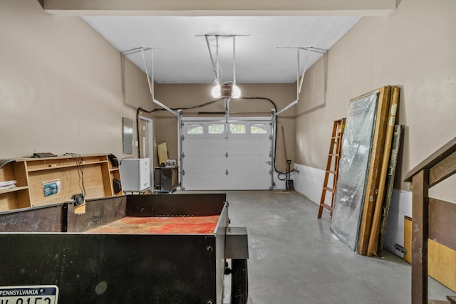 371 Echo Lake Rd, Tobyhanna, PA 18466 - garage featuring a garage door opener and electric panel