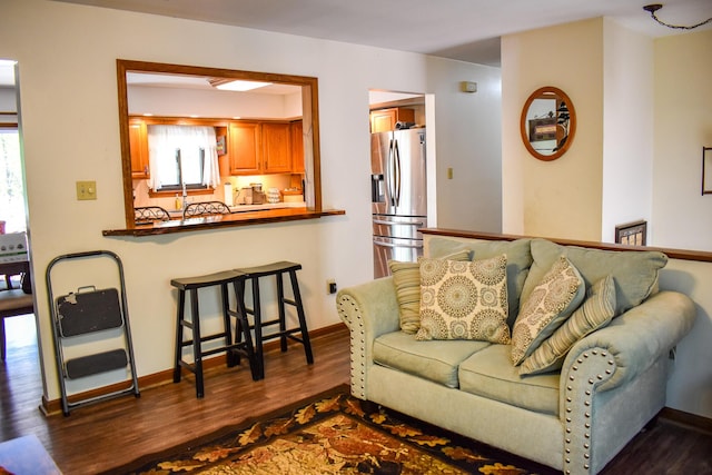 8044 Promontory Dr, White Haven, PA 18661 - living area featuring dark wood finished floors and baseboards