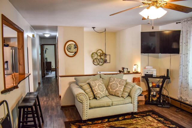 8044 Promontory Dr, White Haven, PA 18661 - living room featuring wood finished floors, a ceiling fan, and baseboards