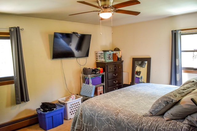 8044 Promontory Dr, White Haven, PA 18661 - carpeted bedroom featuring baseboard heating and a ceiling fan
