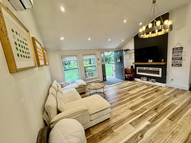1110 Lehigh Cir, Tobyhanna, PA 18466 - living area with vaulted ceiling, wood finished floors, recessed lighting, and a chandelier