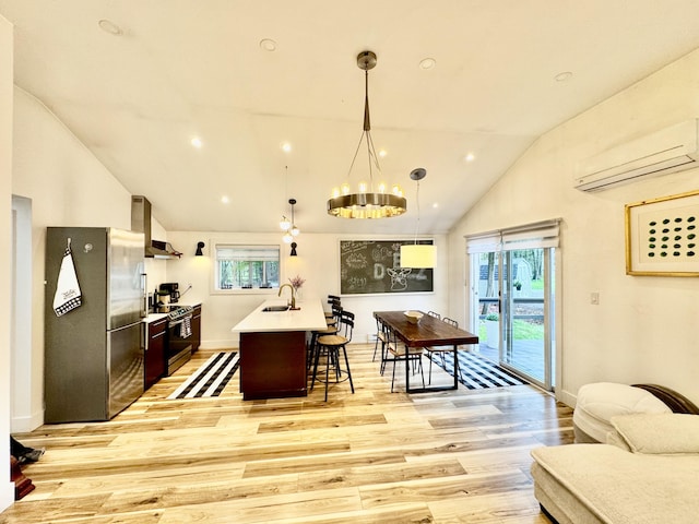 1110 Lehigh Cir, Tobyhanna, PA 18466 - kitchen with stainless steel appliances, a wall mounted AC, wall chimney exhaust hood, healthy amount of natural light, and recessed lighting