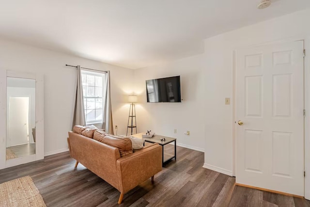 3114 Fairfax Ter, East Stroudsburg, PA 18301 - living area featuring dark wood-style flooring and baseboards