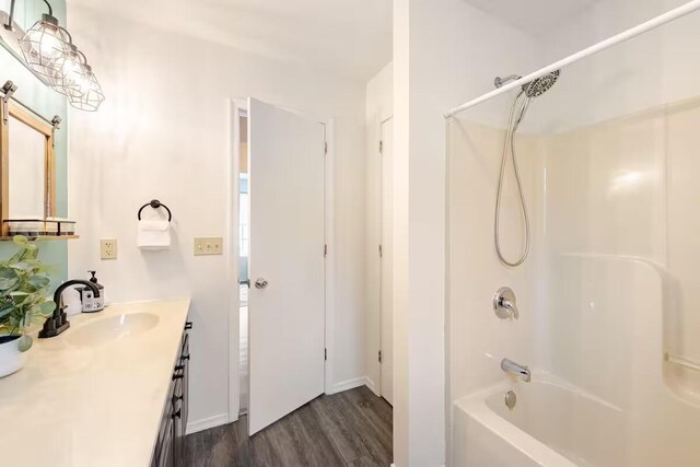 3114 Fairfax Ter, East Stroudsburg, PA 18301 - bathroom with shower / bath combination, vanity, and wood finished floors